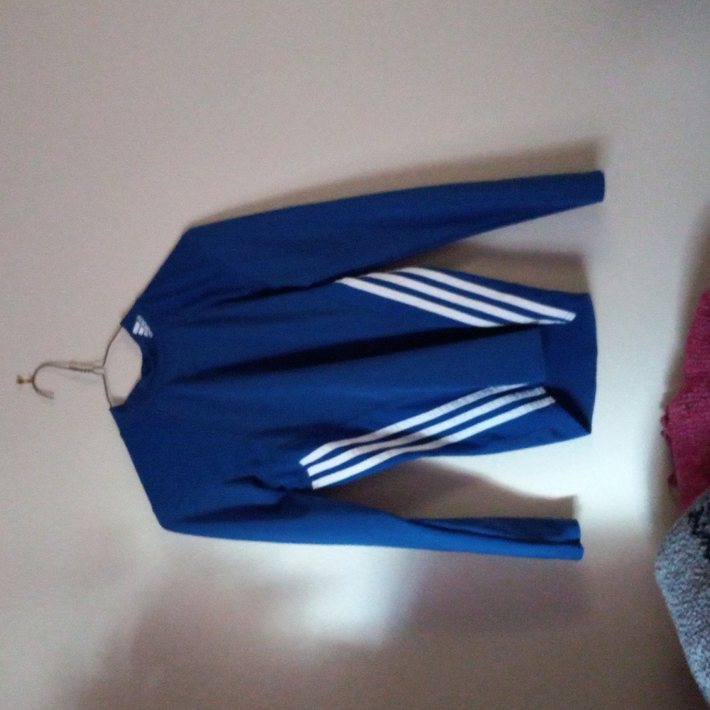 A blue Adidas shirt